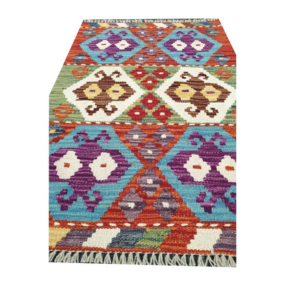 Pattern detail of Afghan Chobi Kilim hand-woven wool rug with colourful geometric diamonds