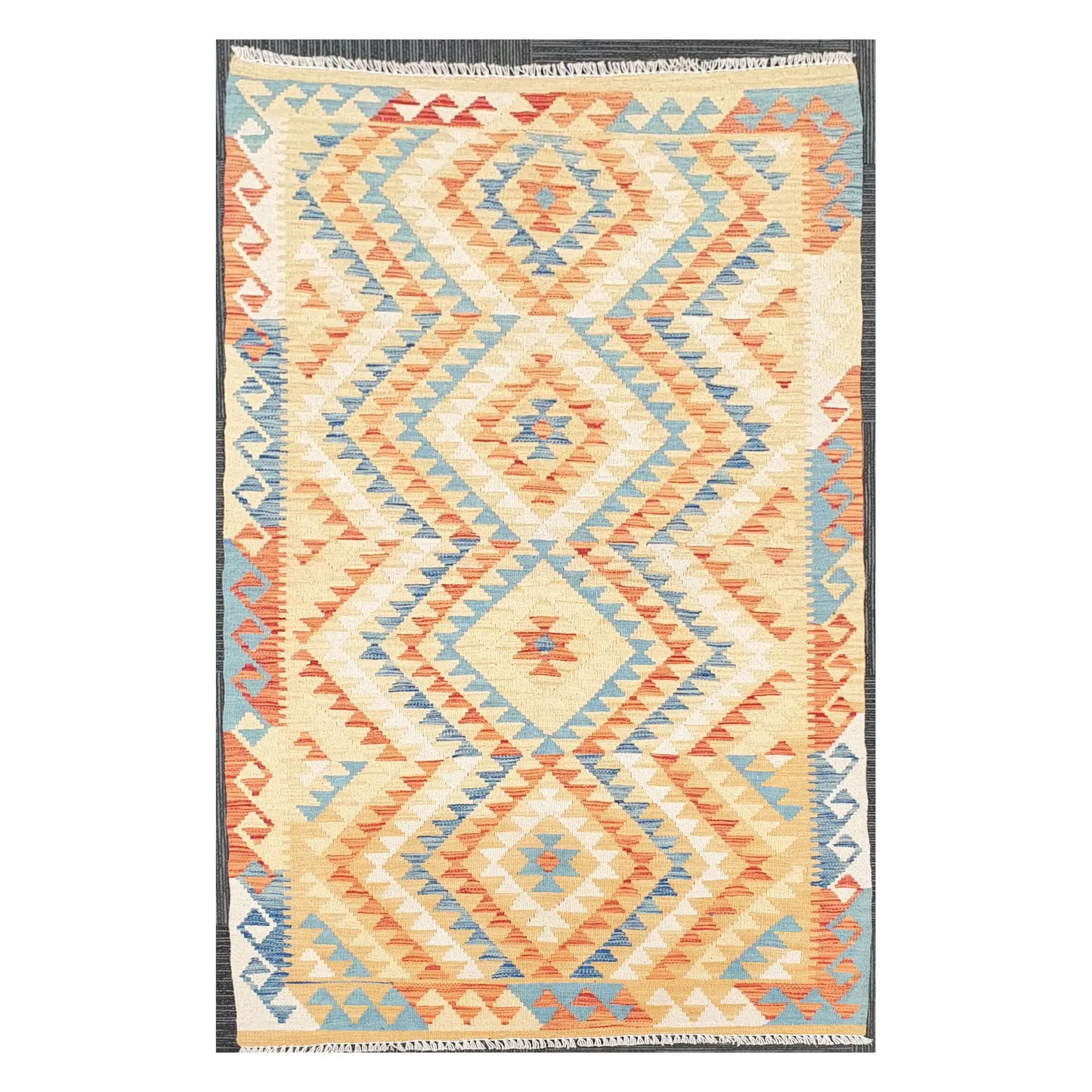 Full view of Afghan Chobi Kilim flatweave wool rug with chevron diamond field on an ivory ground, 188 x 103 cm