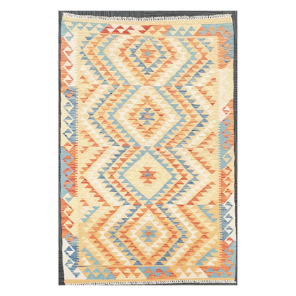 Full view of Afghan Chobi Kilim flatweave wool rug with chevron diamond field on an ivory ground, 188 x 103 cm