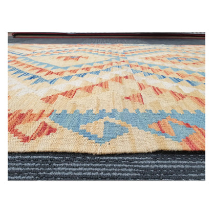 Low-angle close-up of Afghan Chobi Kilim showing wool flatweave texture and geometric pattern detail, 188 x 103 cm
