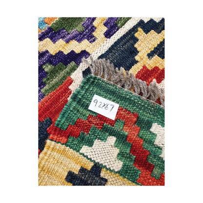 Fringe detail of Afghan Chobi Kilim hand-woven wool rug showing woven texture and product tag