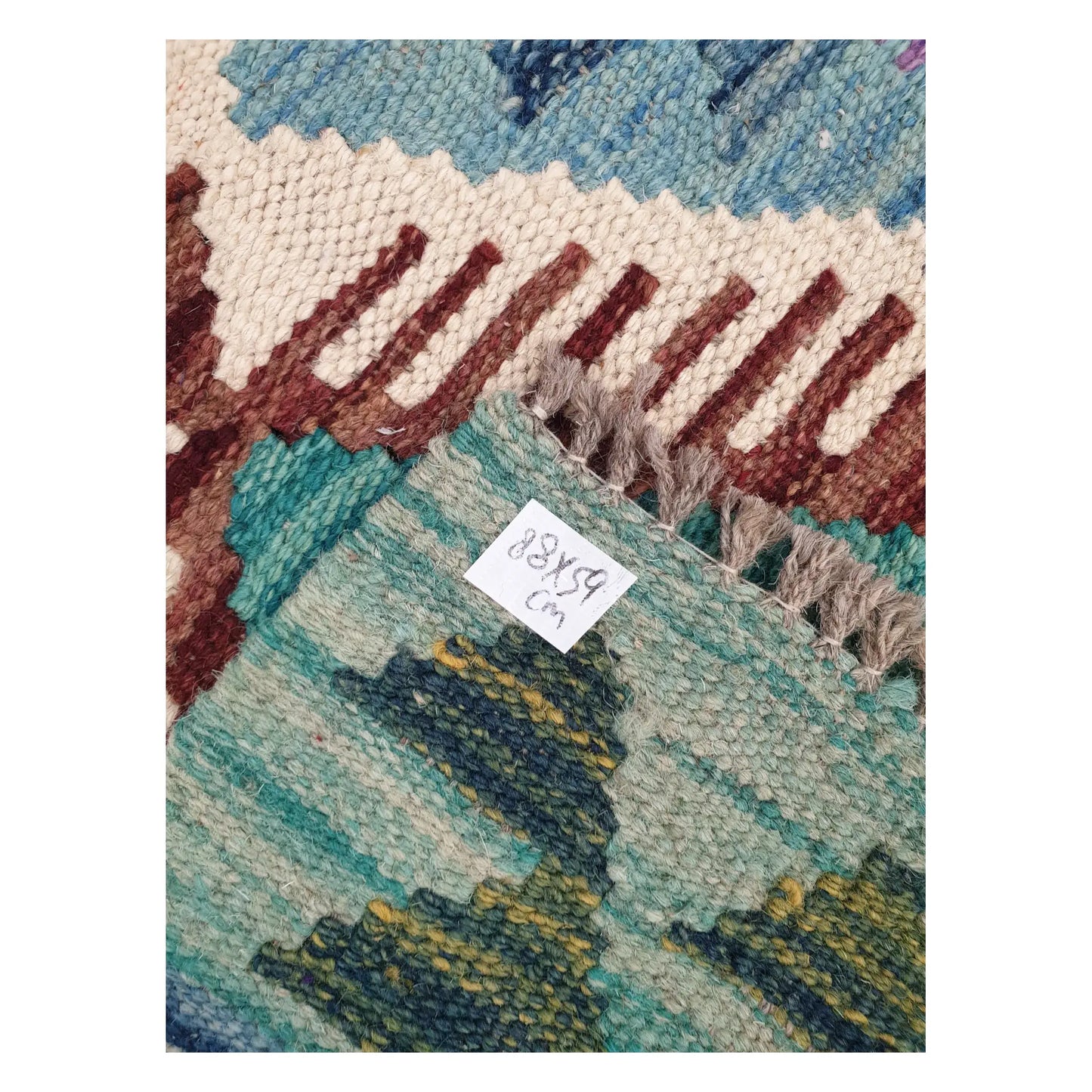 Close-up of Afghan Chobi Kilim wool texture, fringe, and geometric detail, 88 x 59 cm