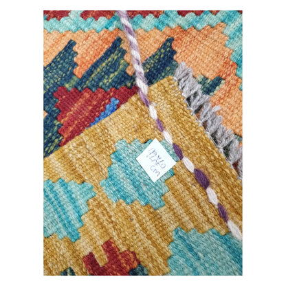 Close-up of Afghan Chobi Kilim wool flatweave texture, fringe, and geometric colour detail, 92 x 60 cm