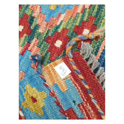 Close-up of Afghan Chobi Kilim wool texture, fringe, and multicolour geometric detail, 96 x 62 cm