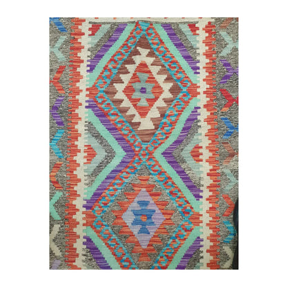 Centre detail of Afghan Chobi Kilim rug showing stepped geometric medallion design