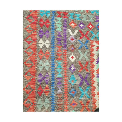 Side border detail of Afghan Chobi Kilim rug showing colourful flatweave pattern