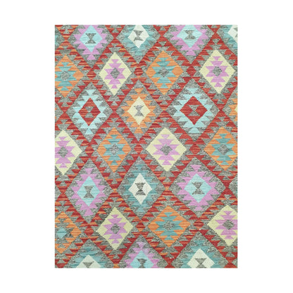 Pattern detail of Afghan Chobi Kilim pastel diamond rug showing aqua, coral and ivory motifs
