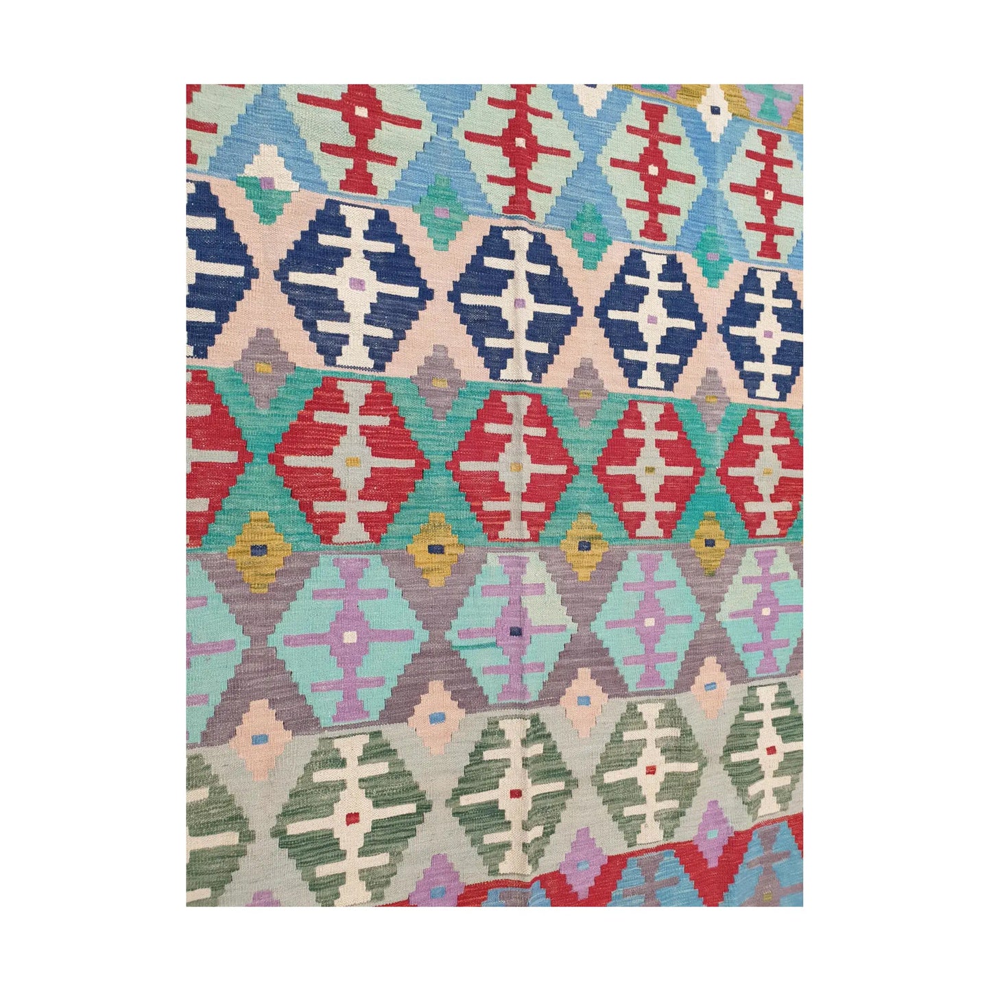 Centre detail of Afghan Chobi Kilim pastel tribal rug showing geometric flatweave pattern