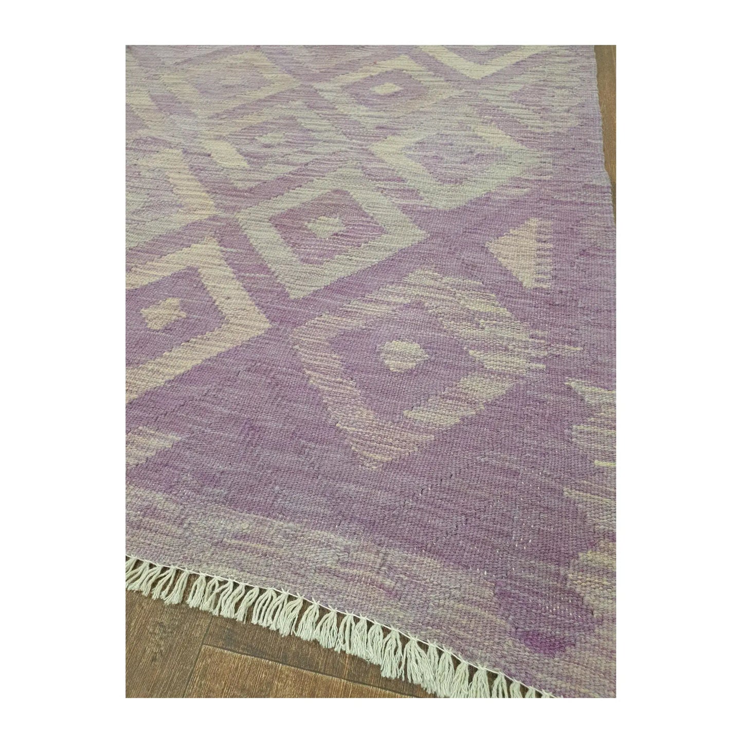 Border detail of Afghan Chobi Kilim purple diamond rug showing fringe and woven motifs