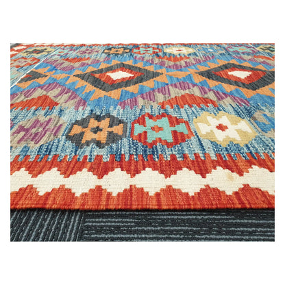 Low-angle close-up of Afghan Chobi Kilim showing wool flatweave texture and geometric tribal pattern, 123 x 90 cm