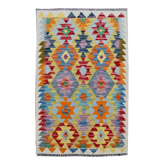 Afghan Chobi Kilim rug 130 x 78 cm full view with ivory ground and colourful geometric diamond motifs
