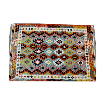 Front view of Afghan Chobi Kilim rug with repeated diamond motifs and ivory border