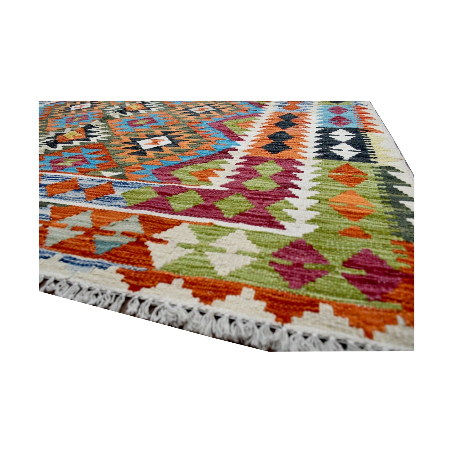 Angled fringe and edge detail of Afghan Chobi Kilim rug showing wool flatweave texture with orange, green, burgundy and ivory motifs