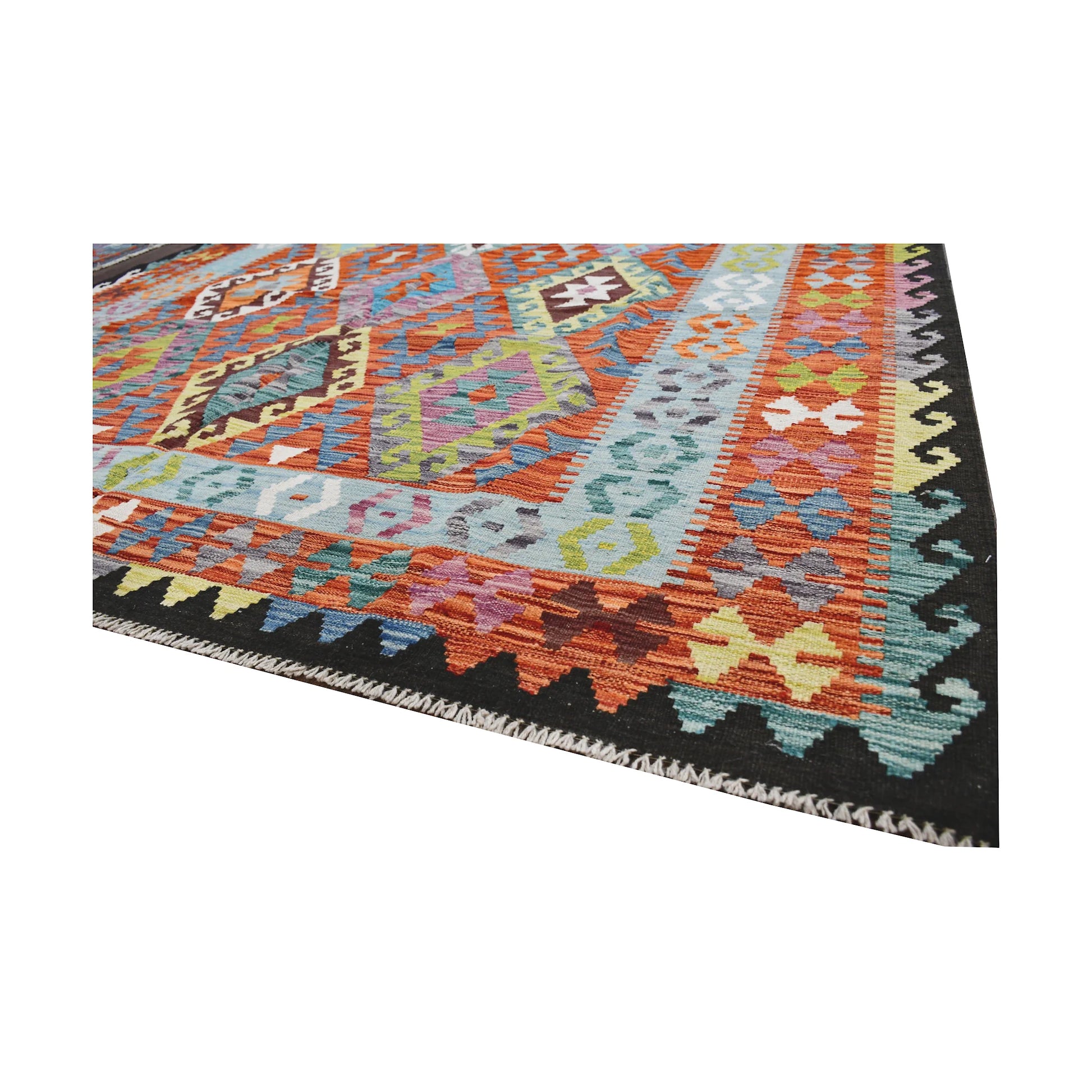 Angled fringe detail of Afghan Chobi Kilim rug showing flatwoven wool texture and colourful border