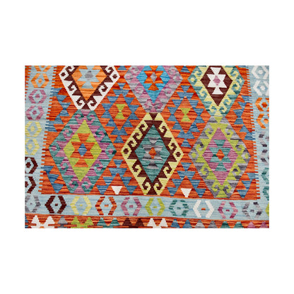 Field and border detail of Afghan Chobi Kilim rug with repeated diamond motifs and ivory accent border