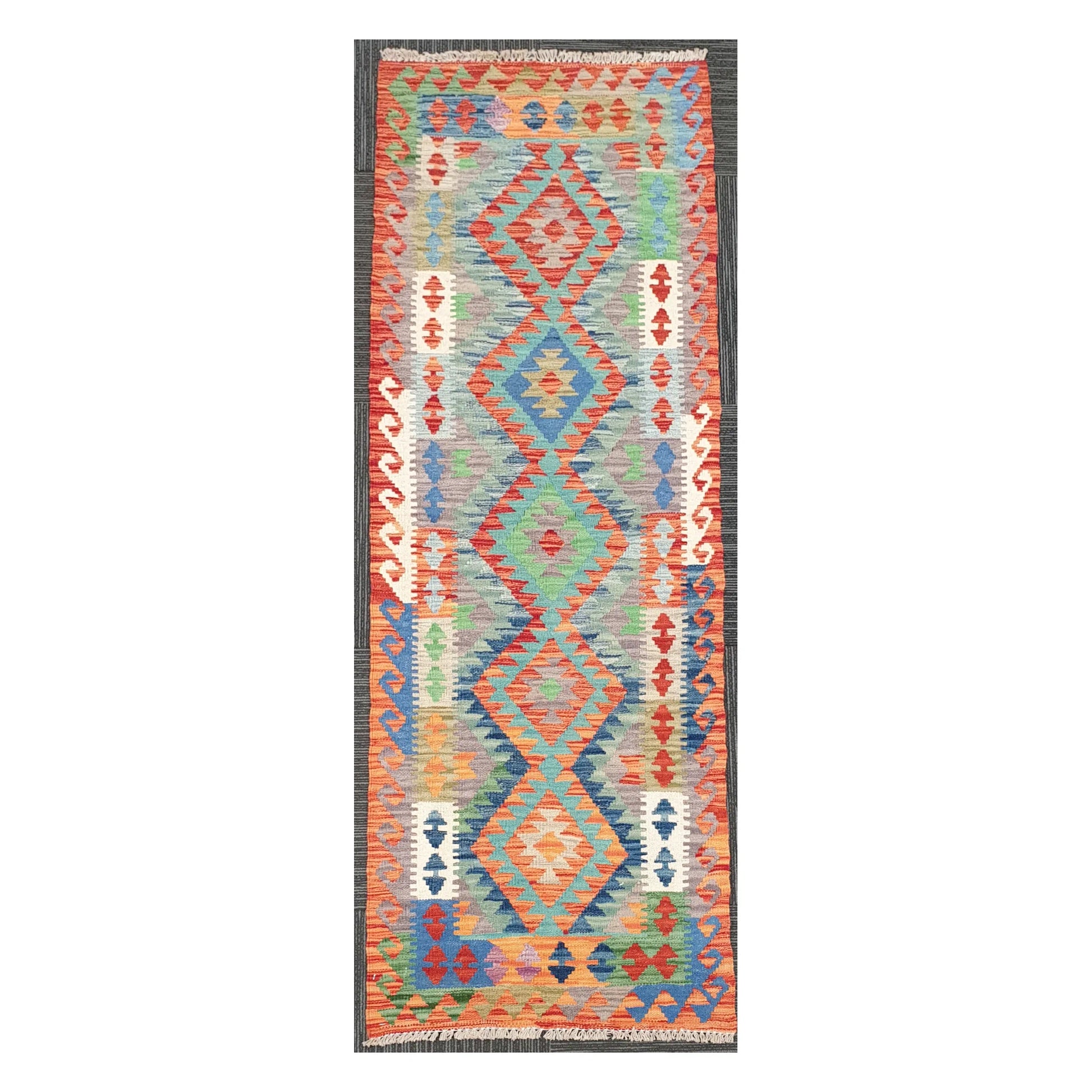 Full view of Afghan Chobi Kilim handwoven wool runner with aqua linked medallion design, 207 x 65 cm