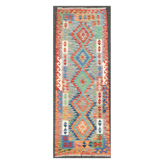 Full view of Afghan Chobi Kilim handwoven wool runner with aqua linked medallion design, 207 x 65 cm