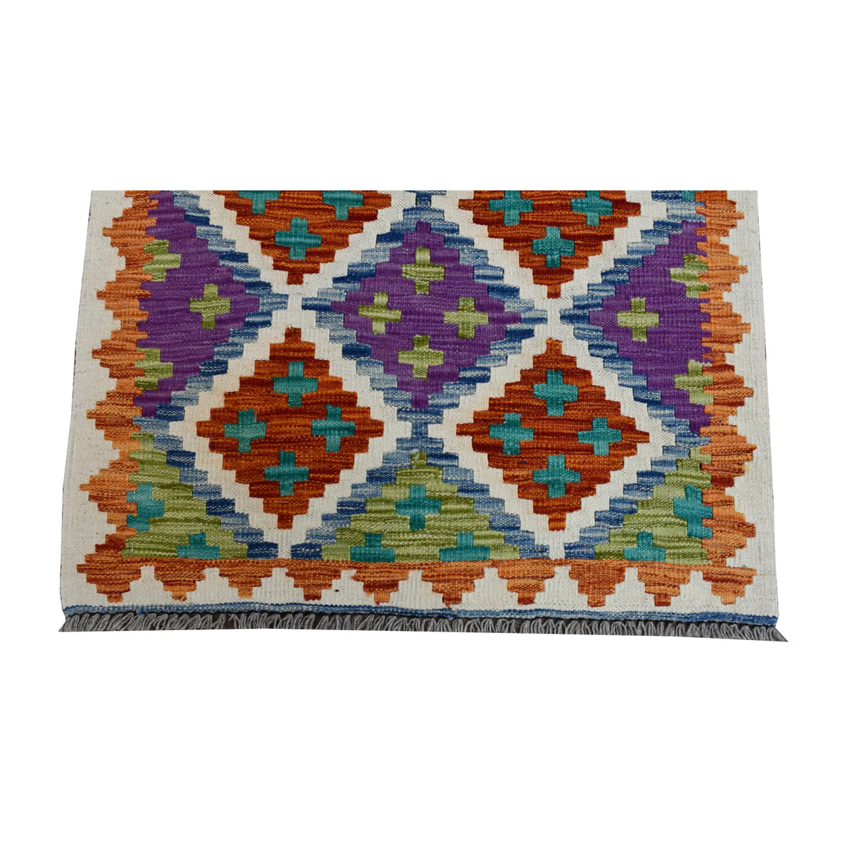 End detail of Afghan Chobi Kilim runner showing terracotta, turquoise and lilac diamonds on the ivory lattice