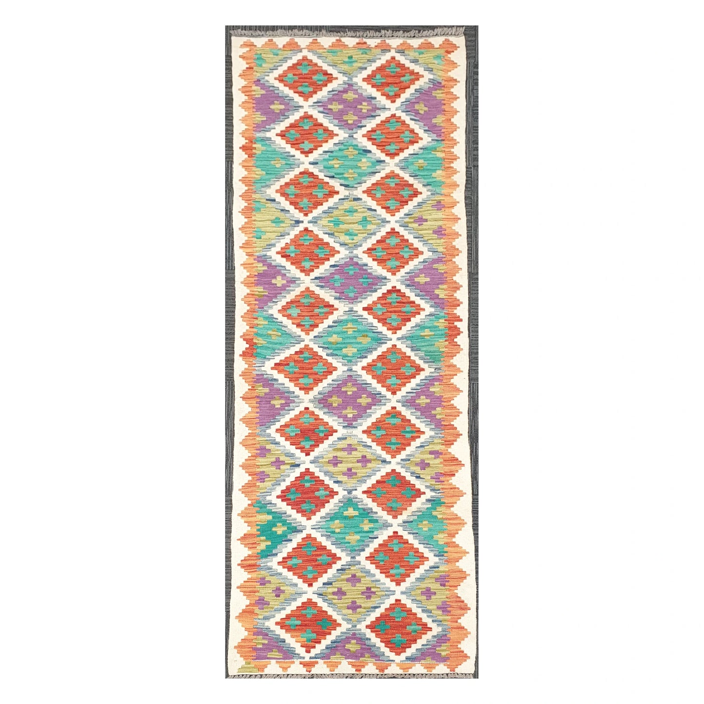 Full view of Afghan Chobi Kilim handwoven wool runner with ivory diamond trellis design, 286 x 77 cm