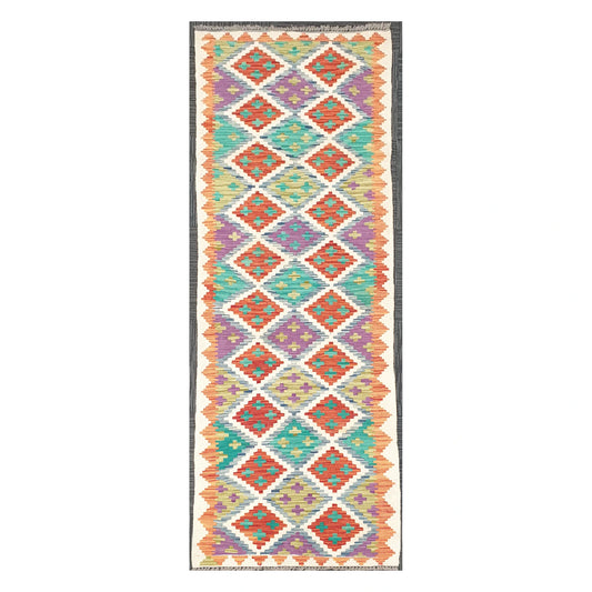 Full view of Afghan Chobi Kilim handwoven wool runner with ivory diamond trellis design, 286 x 77 cm