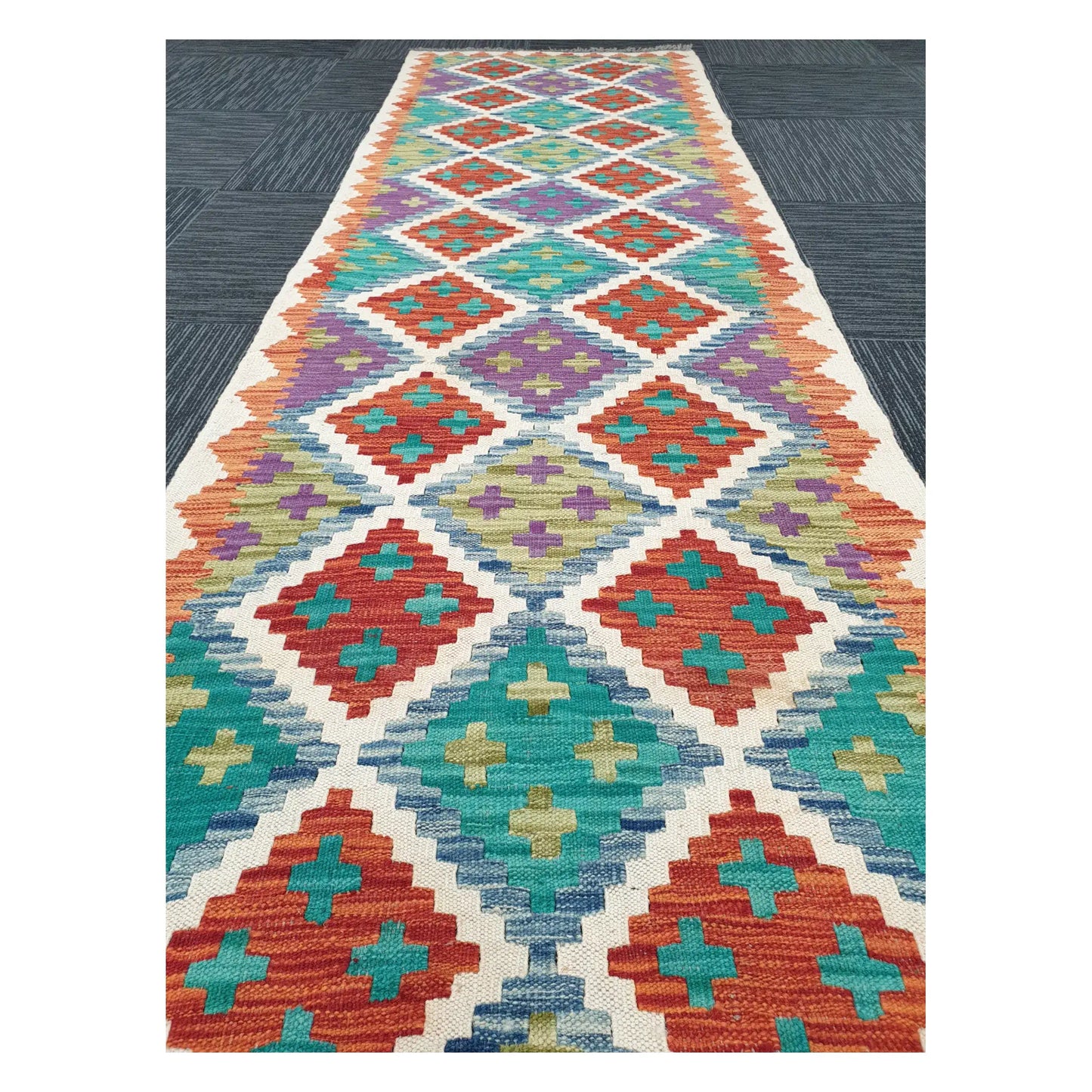 Close runner view of Afghan Chobi Kilim handwoven flatweave with ivory diamond trellis design, 286 x 77 cm