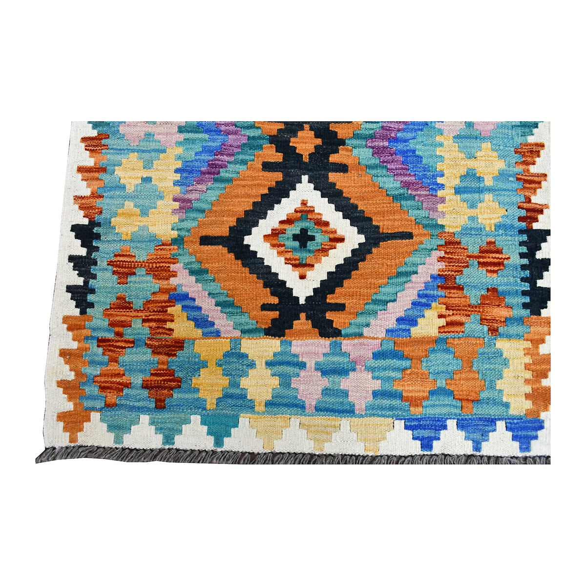 End detail of Afghan Chobi Kilim runner showing a large terminal diamond surrounded by stepped geometric motifs