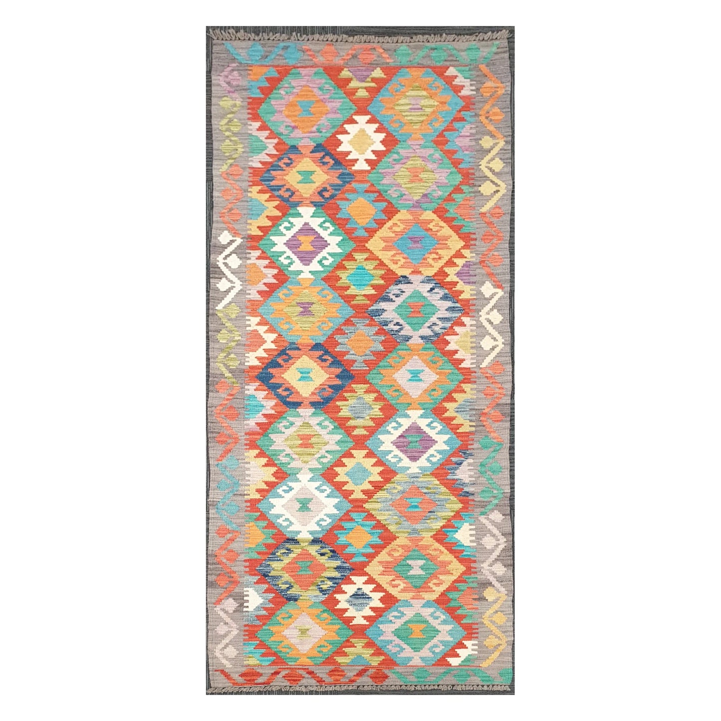 Full view of Afghan Chobi Kilim handwoven wool runner with pastel diamond chain design, 291 x 81 cm