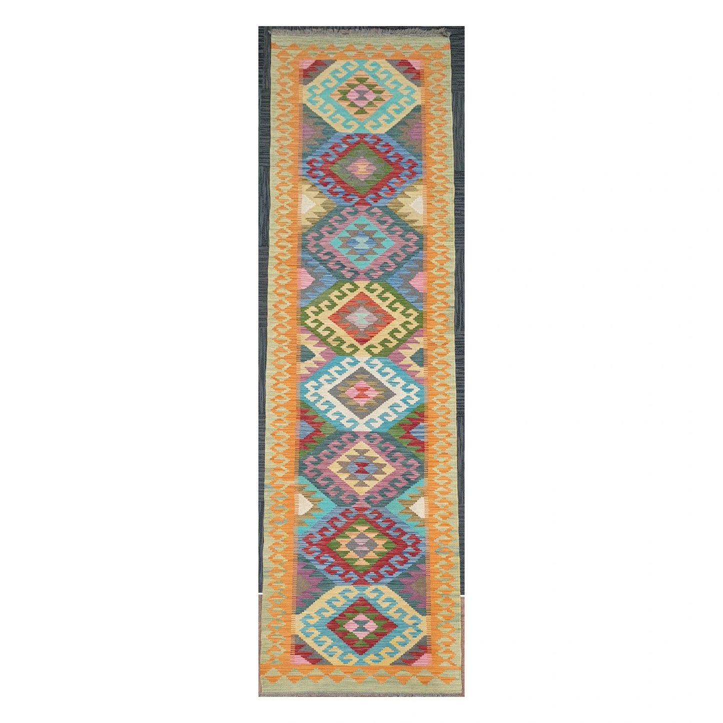 Full view of Afghan Chobi Kilim handwoven wool runner with golden border medallion design, 386 x 86 cm