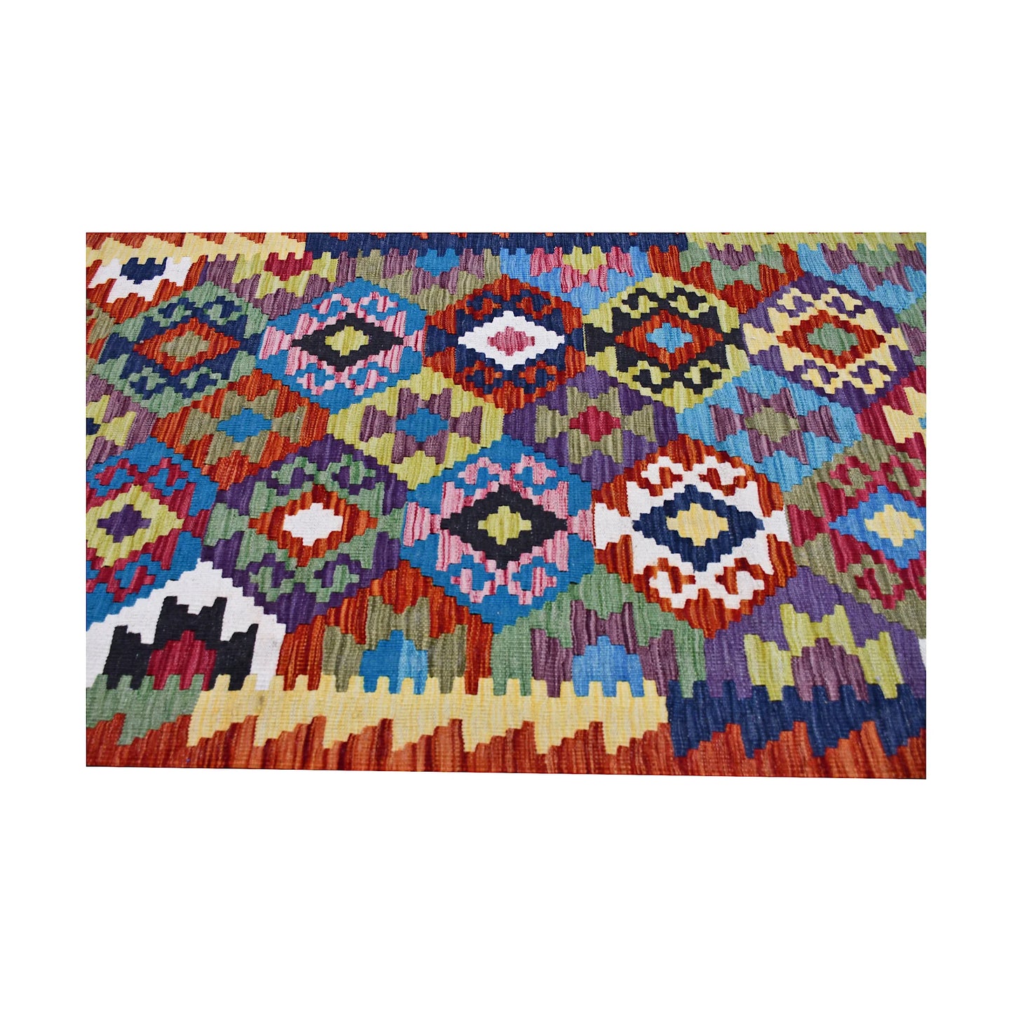 Close pattern detail of Afghan Chobi Kilim runner with jewel-toned geometric diamonds and woven texture
