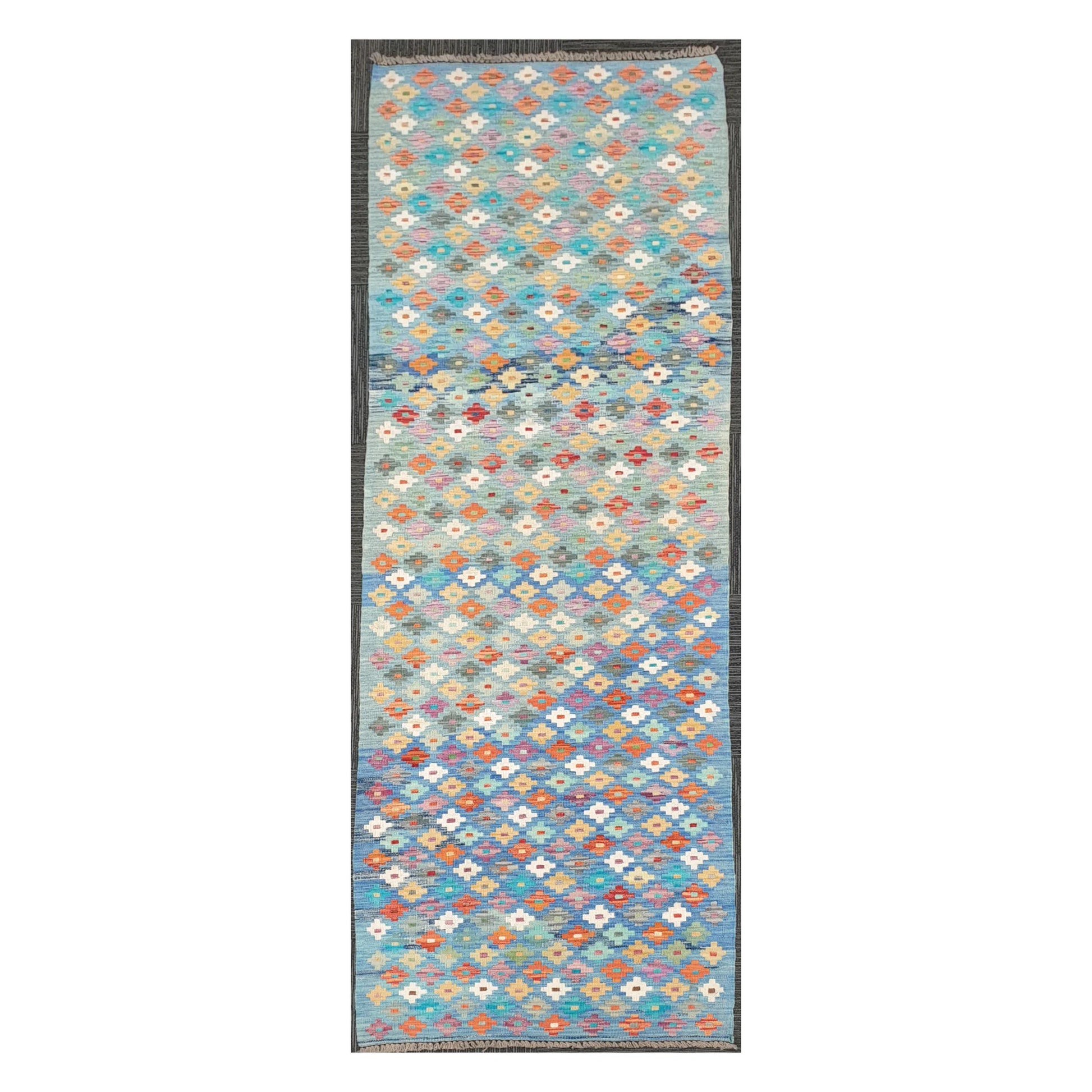 Full view of Afghan Chobi Kilim handwoven wool runner rug with sky blue floral diamond grid design, 303 x 80 cm
