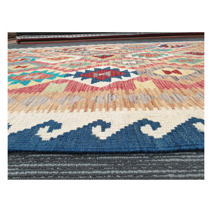Low-angle close-up of Afghan Chobi Kilim showing flatweave wool texture and blue border detail, 178 x 128 cm
