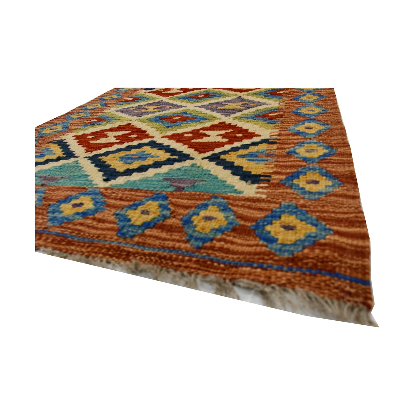 Angled fringe and flatweave detail of Afghan Chobi Kilim wool rug showing rust, blue and ivory geometric pattern