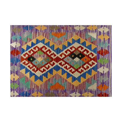 Close-up of Afghan Chobi Kilim wool rug showing mauve double diamond panel with ivory lattice and multicolour tribal motifs