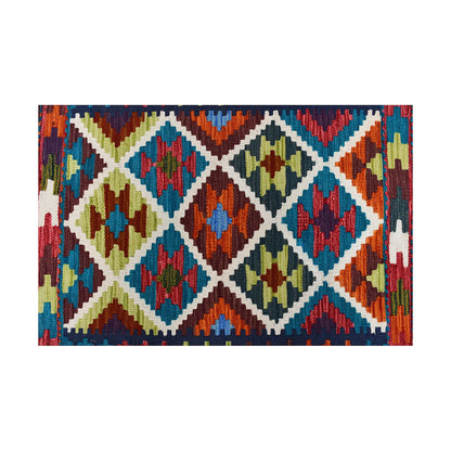 Close-up of Afghan Chobi Kilim wool rug showing ivory lattice diamond panel with teal, rust, mustard and burgundy motifs