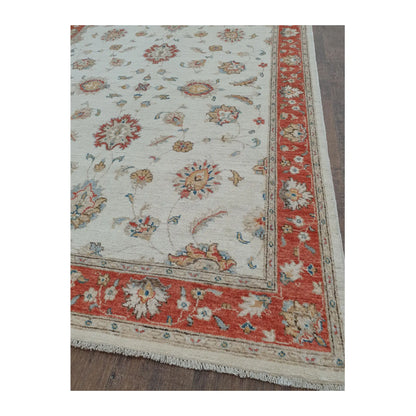 Border detail of Afghan Chobi rug showing red border and off-white field