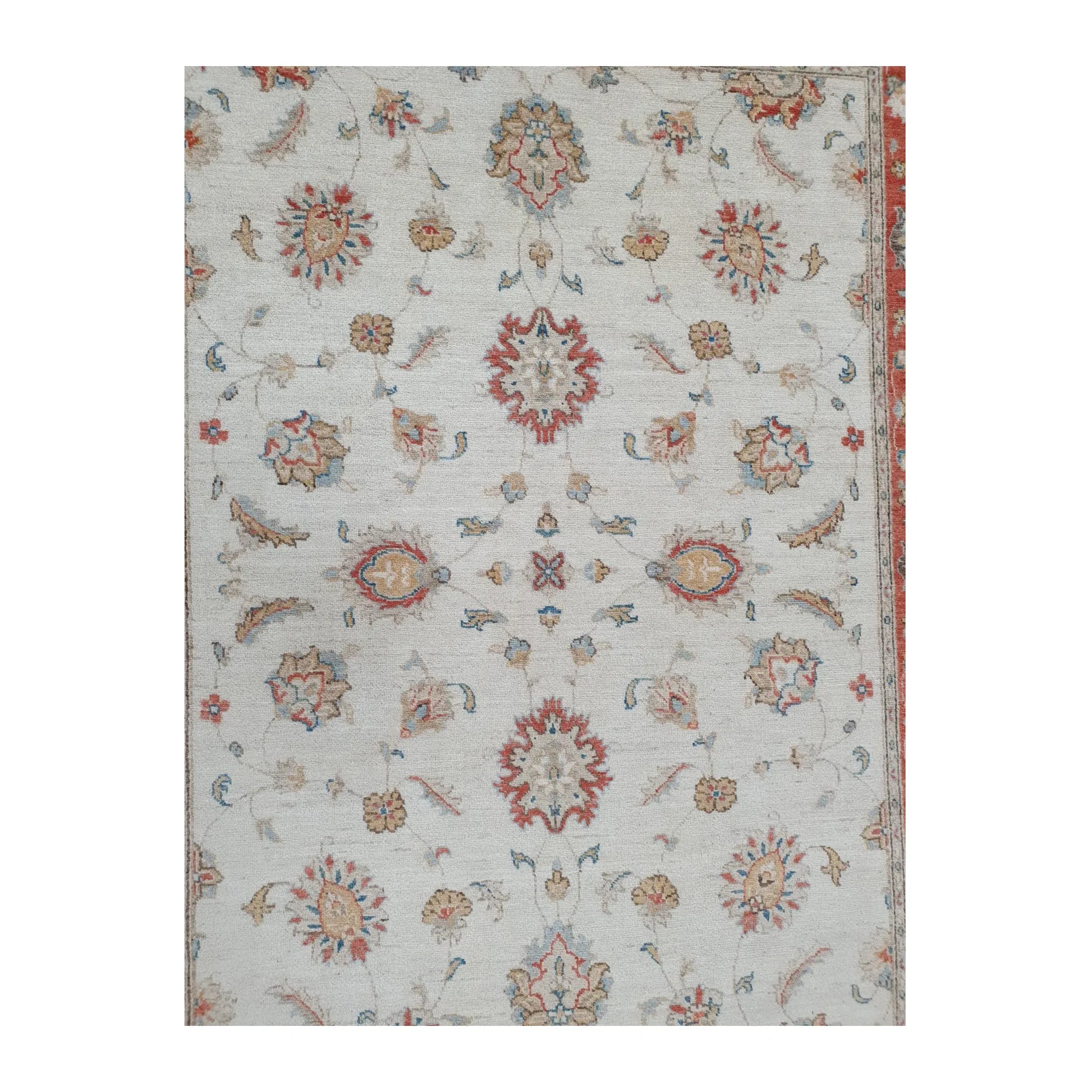Field detail of Afghan Chobi rug showing delicate floral motifs
