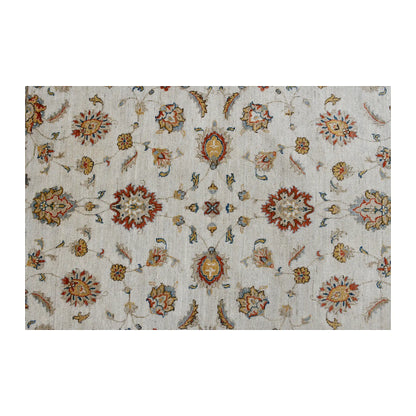 Field detail of Afghan Chobi rug showing repeating floral rosettes and scrolling vines on an off-white ground