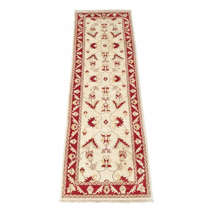 Angled full view of Afghan Chobi red border runner 282 x 89 cm with beige floral field