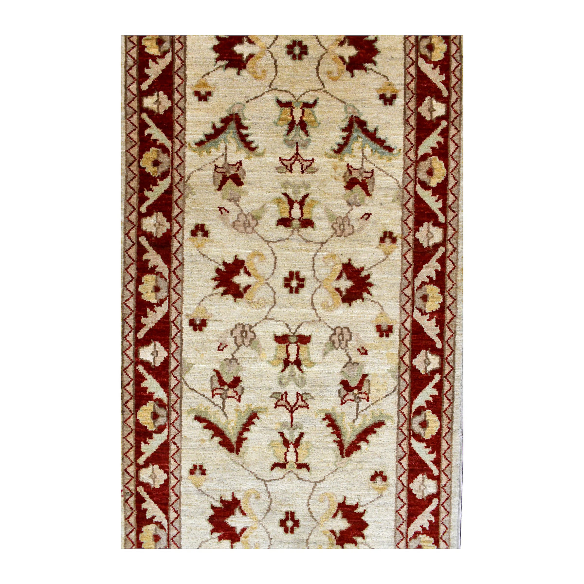 Field detail of Afghan Chobi runner with paired red blossoms, curling vines and muted gold and green motifs