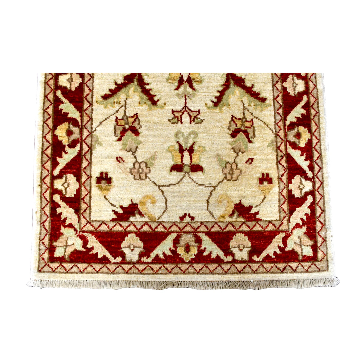 Fringe-end detail of Afghan Chobi runner showing its red floral border and narrow diamond bands