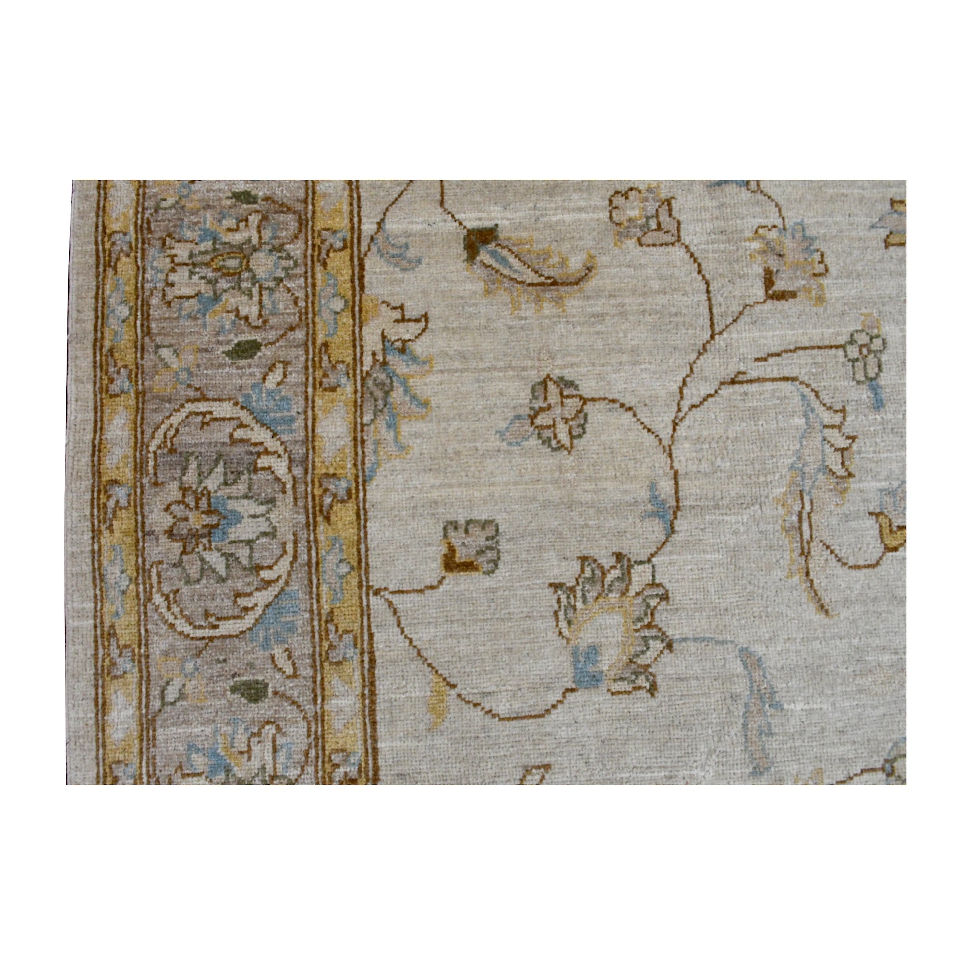Close-up of Afghan Chobi soft beige rug showing the pale blue and gold floral border beside the open field with delicate vine motifs