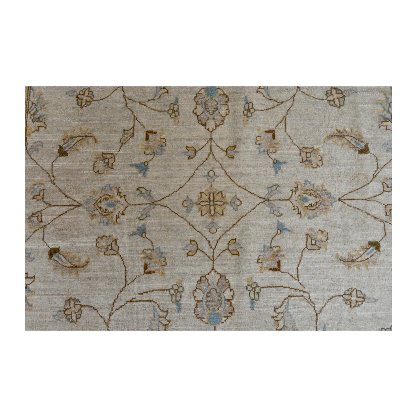 Field detail of Afghan Chobi rug showing symmetrical floral-vine motifs across the soft beige field