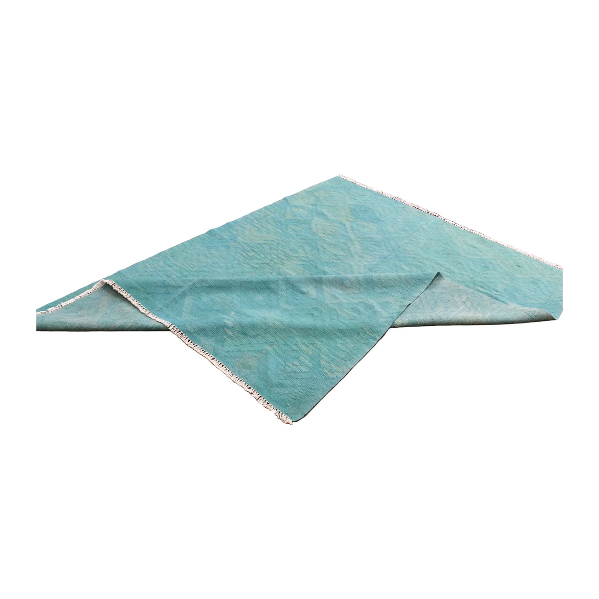 Folded view of Afghan Chobi kilim showing its blue-green front, lighter reverse and ivory fringe