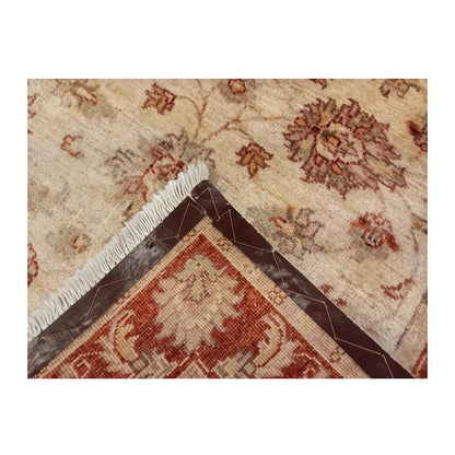 Folded corner showing the floral wool pile, reverse weave and reinforced backing edge