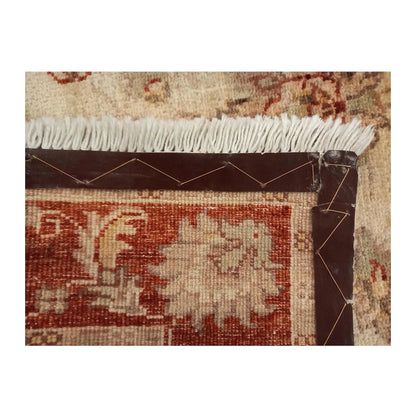 Close view of the reverse weave, reinforced corner and cream fringe