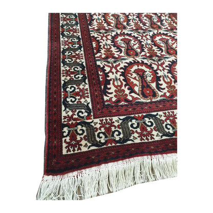 Close-up of Afghan Ersari wool rug showing border detail, fringe edge and hand-knotted pile texture, 155 x 104 cm