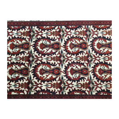 Detail of Afghan Ersari Fine hand-knotted wool rug showing red field, cream motifs and framed border, 155 x 104 cm