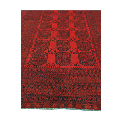 Tonal gul field detail of Afghan Ersari rug showing repeated medallion pattern in deep red and burgundy tones