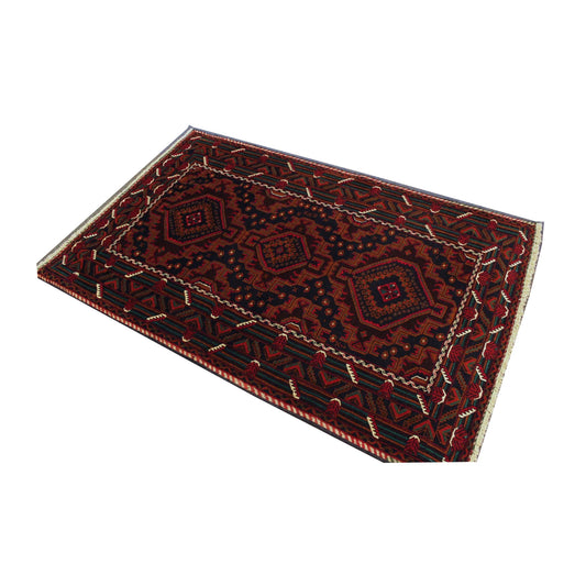 Angled full view of Afghan Fine Baluchi wool rug showing the three medallions and richly patterned borders
