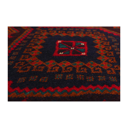 Close-up of Afghan Fine Baluchi rug showing the central field motif and surrounding angular pattern